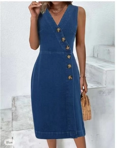 Detail of deep V-neck sleeveless denim dress with vintage buttons and slim fit cut