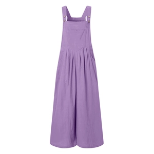 Detail of purple wide-leg jumpsuit showing natural cotton fabric and decorative buttons
