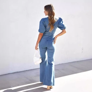 Women's denim jumpsuit with puff sleeves and wide leg pants in vintage blue wash