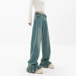 Jean vintage bleu clair à taille haute et jambe large pour femme avec ourlet à volants