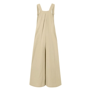 Close-up detail of beige wide-leg jumpsuit with broad straps and pleated front design