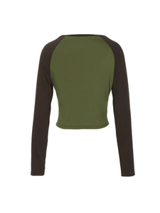 Detail of crop top back view featuring olive green body and brown raglan long sleeves