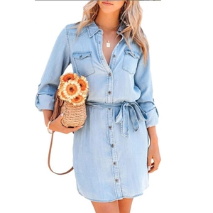 Light blue denim shirt dress with lapel, buttons, and waist tie for casual summer wear