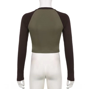 Vintage raglan sleeve crop top with olive body and brown sleeves on a white mannequin