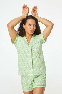 Detail of women's short sleeve pajama set with white rabbit and clover print