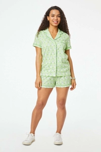 Detail of soft light green pajamas set with white rabbit and green heart print