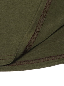 Detail shot of army green knit crop top showing high-quality double-needle hem stitching