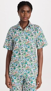 Detail of summer floral print set with short-sleeve button-down shirt and matching shorts
