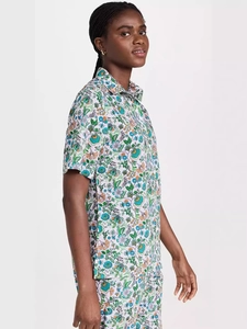 Women's two-piece floral set featuring short sleeve button-down shirt and matching shorts