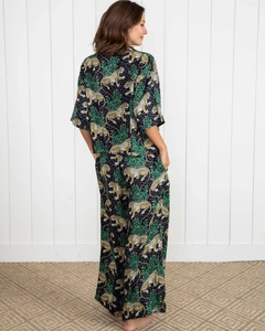 Detail of leopard and jungle print loungewear set featuring wide-leg pants and short sleeves