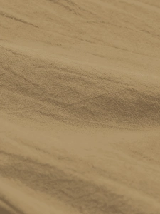 Detailed close-up of textured khaki cotton-linen fabric showing weave and soft folds