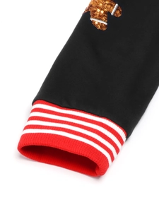 Black Christmas top with red striped cuffs and gingerbread man sequin embroidery