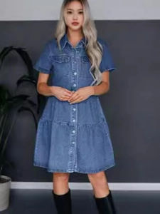 Short sleeve denim dress with collar and button-front closure in mid-blue wash