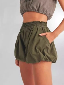 Pantaloncini a palloncino verde scuro da donna con vita elastica e tasche laterali