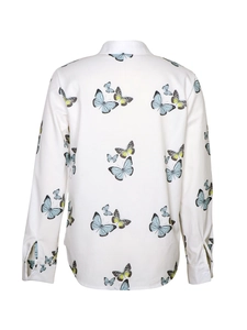 Women's white long-sleeve blouse featuring blue and yellow butterfly prints, back view