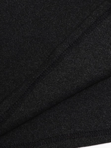 Close-up of black knitted fabric texture with professional double-needle stitching detail