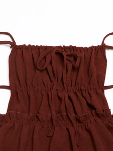 Detail of ruched neckline with bow drawstring on burgundy backless summer dress