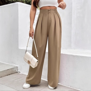 Detail of khaki high-waisted wide-leg trousers featuring double-button waist and pleated design