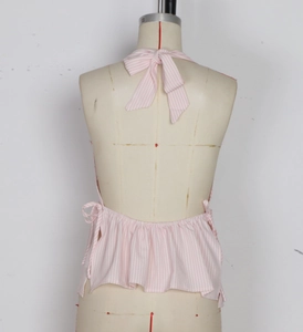 Detailed back view of pink striped halter top featuring big bow tie and elastic waist
