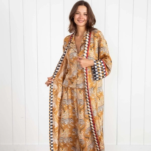 Three-piece tiger print pajama set with robe, button-up top and wide-leg trousers