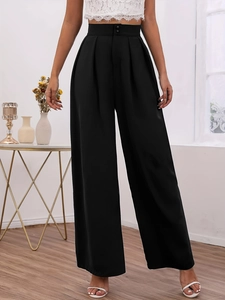 Women's high waist wide leg black trousers with drape effect and front pleat detail