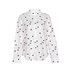 Close-up detail of heart print pattern on white button-down lapel shirt with long sleeves