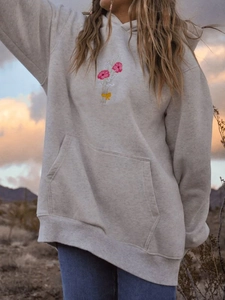 Oversized light grey hoodie with floral embroidery and kangaroo pocket for women