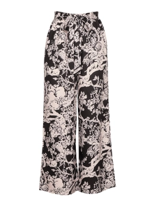 Damesbroek met hoge taille en bloemenprint, wijde pijpen en strikceintuur in zwart