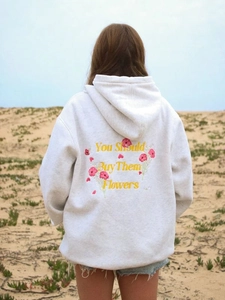 Beige oversized hoodie for women featuring floral embroidery and back typography art