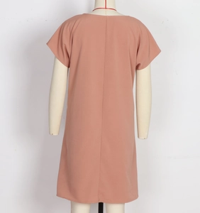 Rear view of loose fit cotton linen dress with short sleeves and round neckline