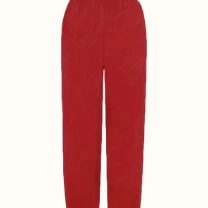 Women's red elastic waist cropped trousers with straight leg cut and side pockets
