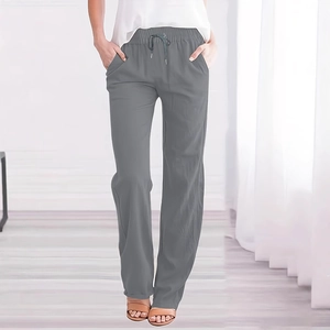 Detail of grey cotton linen pants featuring drawstring elastic waist and side pockets