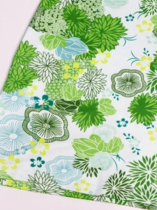 Women's sleeveless round neck beach dress featuring floral print and hemline details