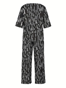 Rear view of two-piece women lounge set with black and white vertical dashed print