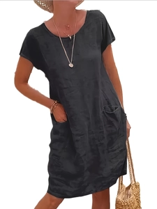 Detailed view of the summer cotton linen dress showing side pockets and fabric texture