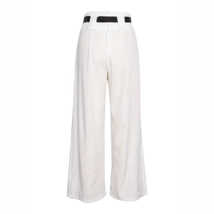 Rear view of white wide-leg trousers featuring a contrasting black waistband and sharp tailoring