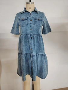 Women's light blue denim shirt dress with short sleeves and tiered ruffle hem