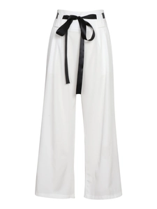 Women's white high-waisted wide leg trousers with a black satin bow belt waist detail