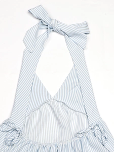 Detail of blue and white striped halter top with bow tie and deep V-neckline