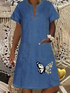 V-neck short sleeve denim dress with butterfly and floral print plus front pockets