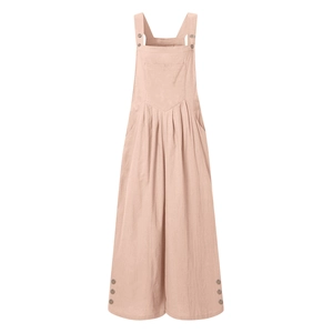 Detail of loose fit sleeveless jumpsuit with buttoned wide straps and side leg buttons