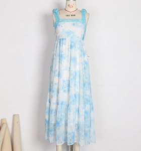 Detail view of the floral blue and white midi dress showing lace trim and square neckline