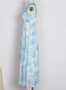 Side view of blue and white floral maxi dress with lace halter neck on mannequin