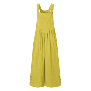 Detail view of mustard yellow wide-leg overalls with front pocket and button straps