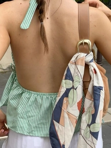 Green and white striped halter backless top for women with a silk scarf accessory