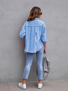 Women's light blue distressed denim jacket with raw hem and back pleat detail