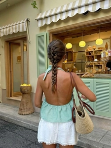 Women's summer green striped backless halter top and white lace skirt outfit