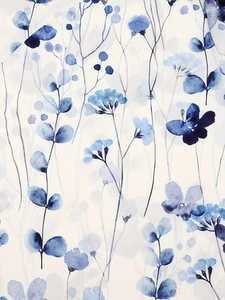 Detailed close-up of blue floral watercolor pattern on white textile fabric