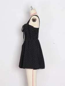 Polka dot backless mini dress with bow tie detail and lace hemline for summer