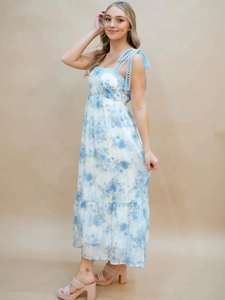 Floral sleeveless midi dress with lace straps and a smocked bodice for summer vacations